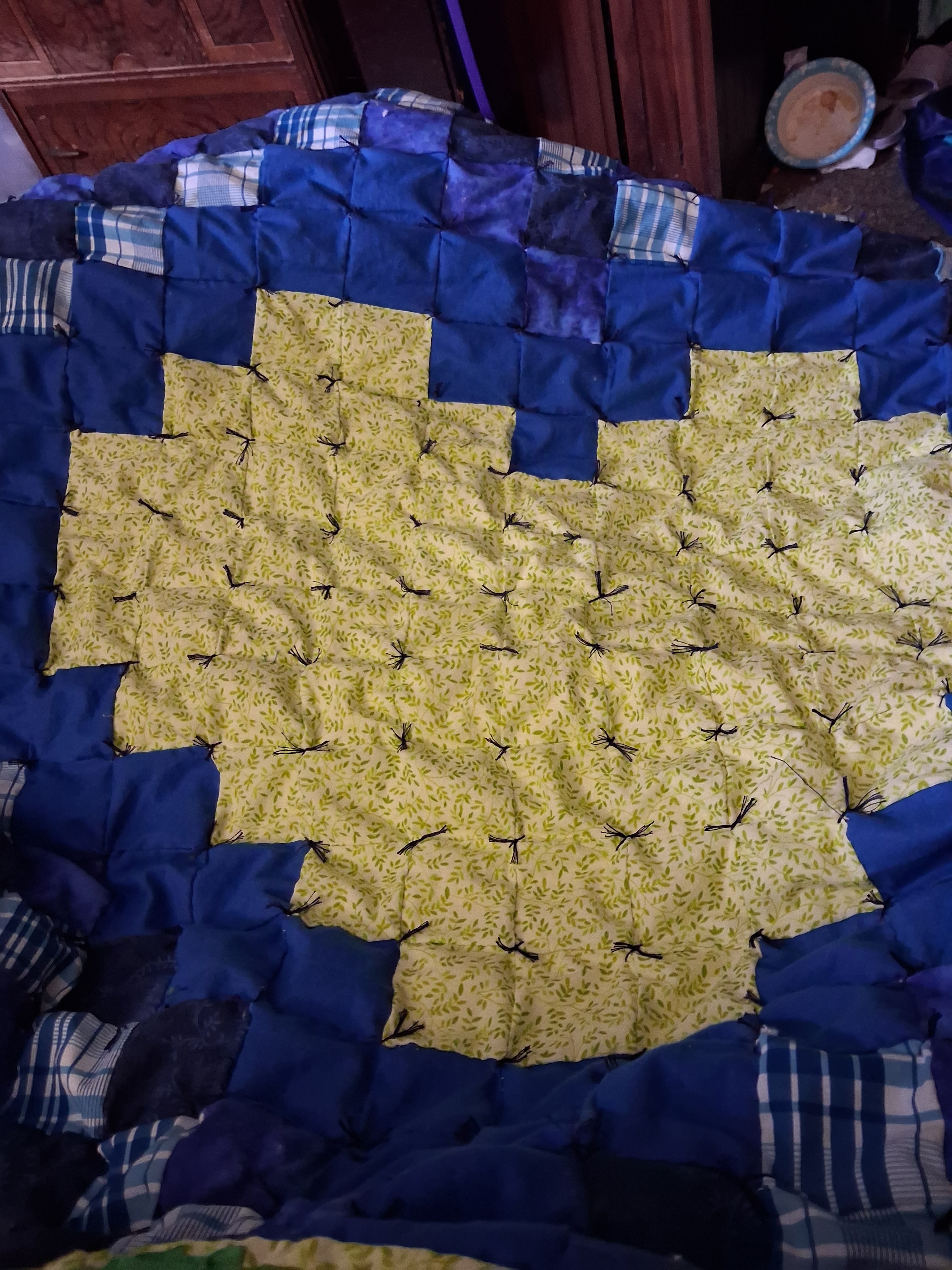 Amy S. Holden quilting in her Asheville studio
